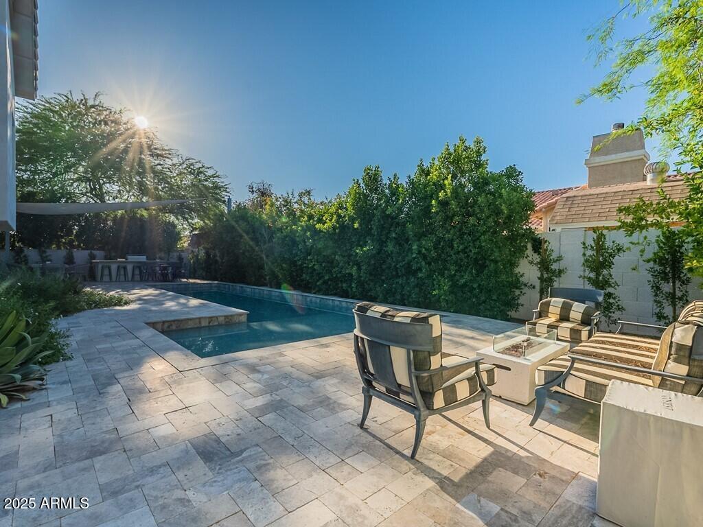 4748 East Redfield Road Phoenix, AZ 85032 - Photo 53 of 73 a view of backyard with seating area and green space