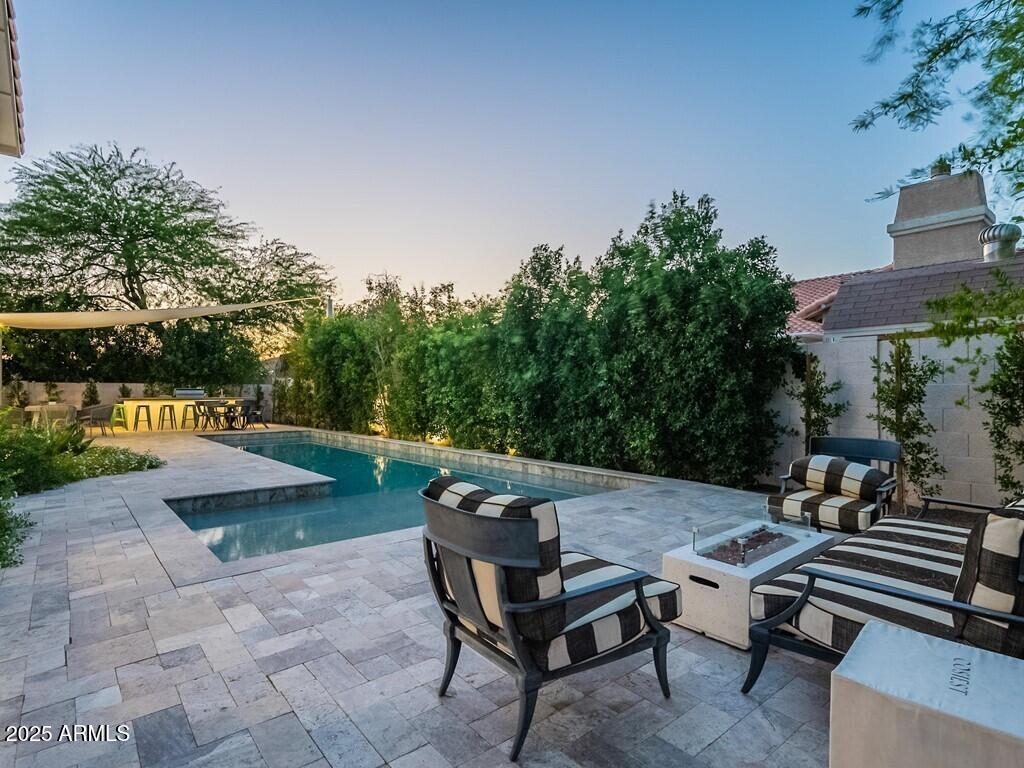 4748 East Redfield Road Phoenix, AZ 85032 - Photo 61 of 73 a view of a backyard with sitting area