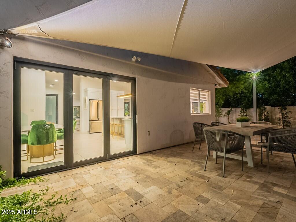 4748 East Redfield Road Phoenix, AZ 85032 - Photo 68 of 73 a view of a dining room with furniture and window