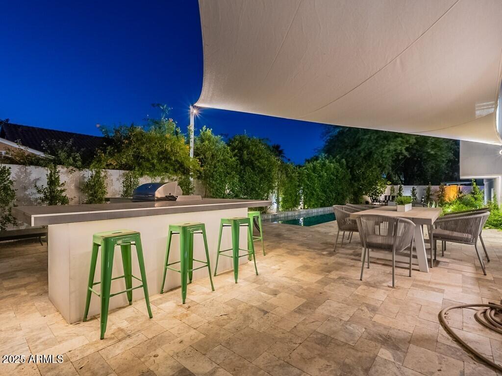 4748 East Redfield Road Phoenix, AZ 85032 - Photo 71 of 73 a view of a chairs and table in patio