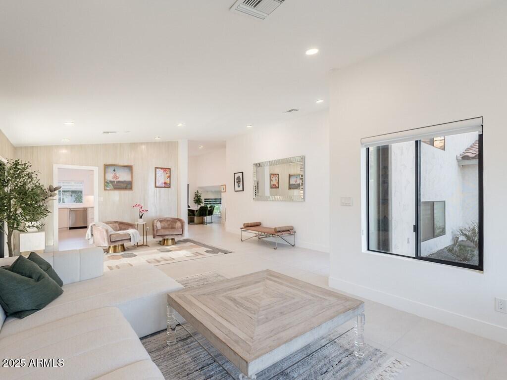 4748 East Redfield Road Phoenix, AZ 85032 - Photo 8 of 73 a living room with furniture and a wooden floor