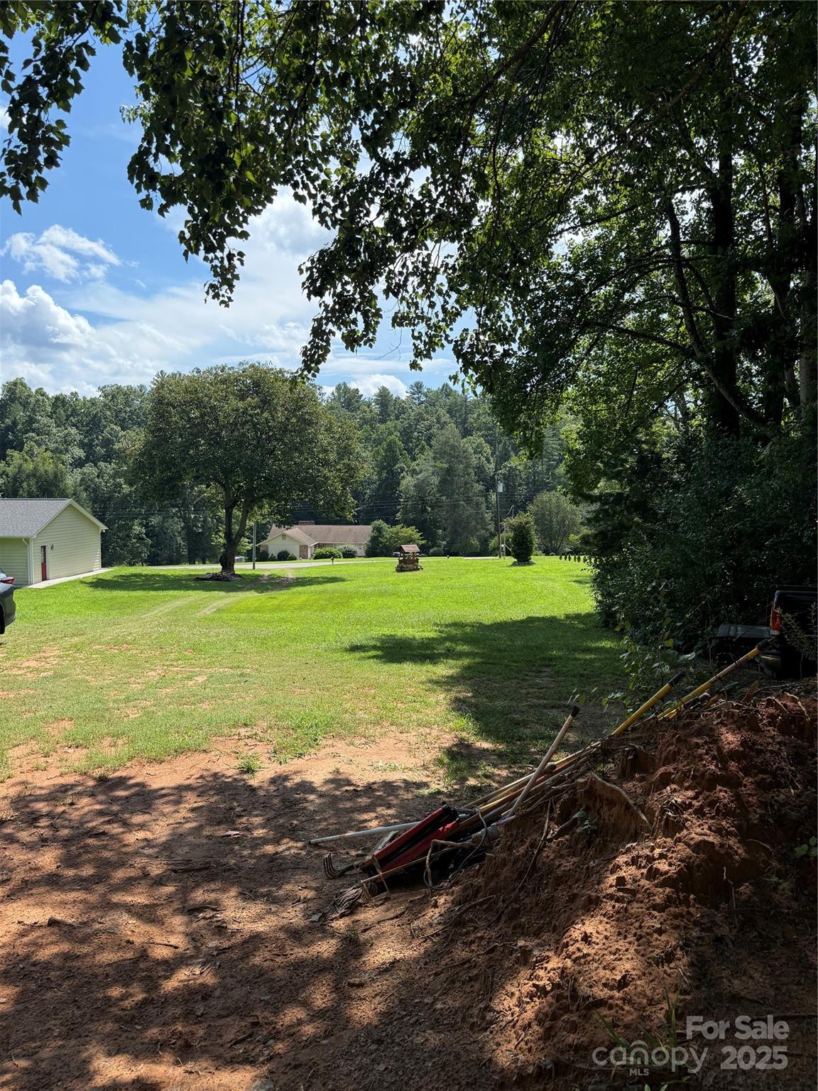 204 Vfw Road Morganton, NC 28655 - Photo 4 of 12 a view of a golf course with a lake view