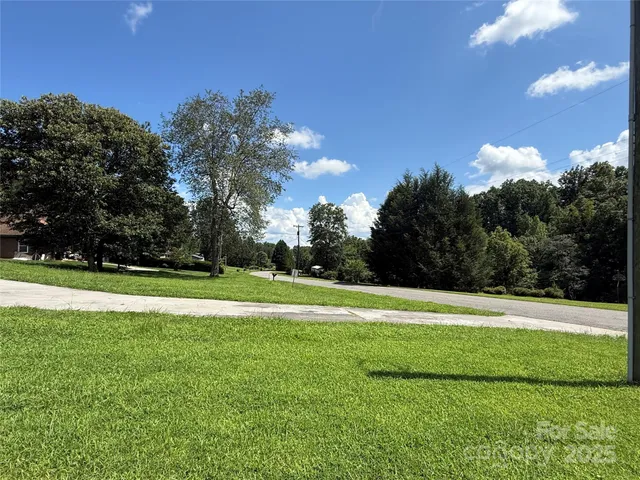 a view of a golf course with a lake