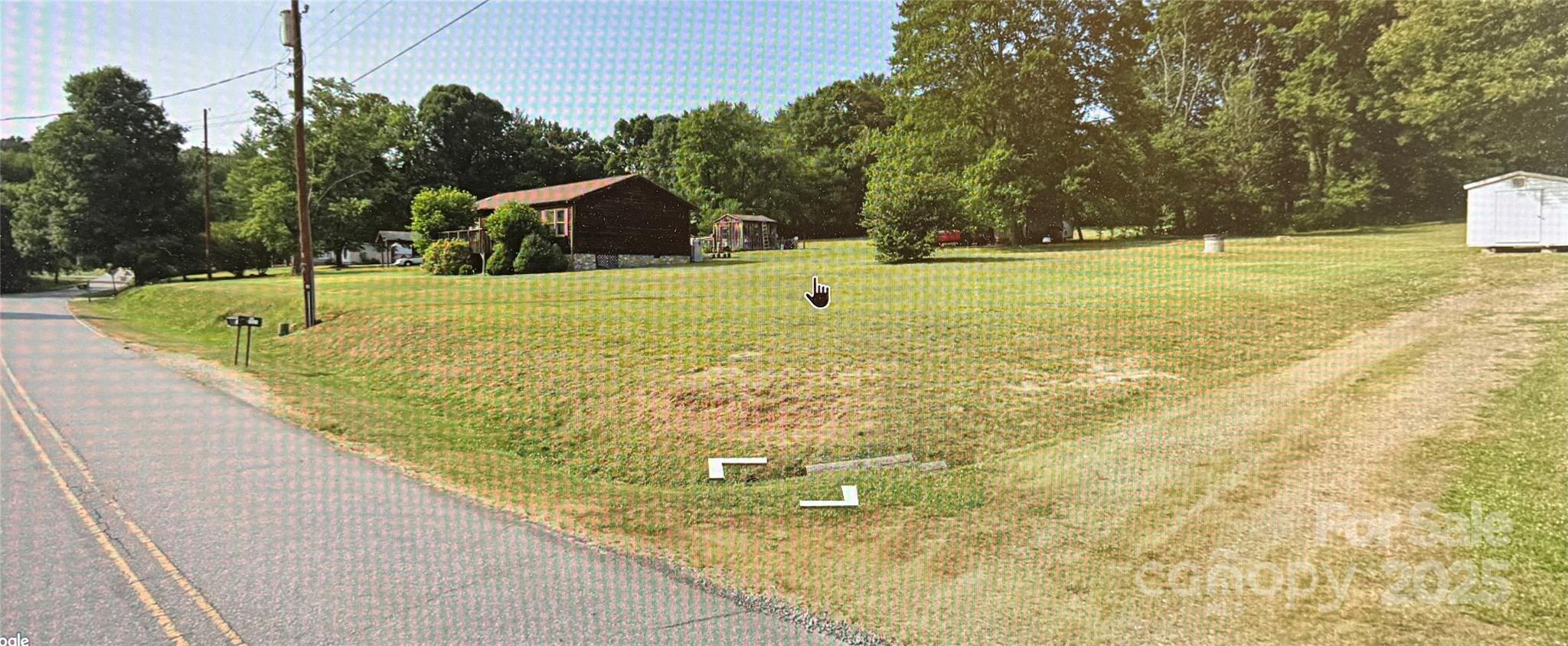 204 Vfw Road Morganton, NC 28655 - Photo 9 of 12 a swimming pool with trees in the background