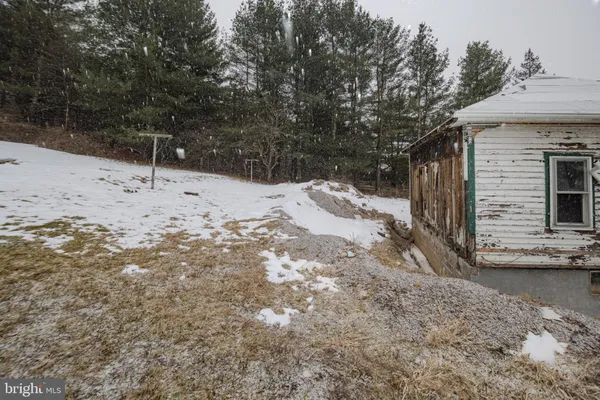 a view of a backyard of a house