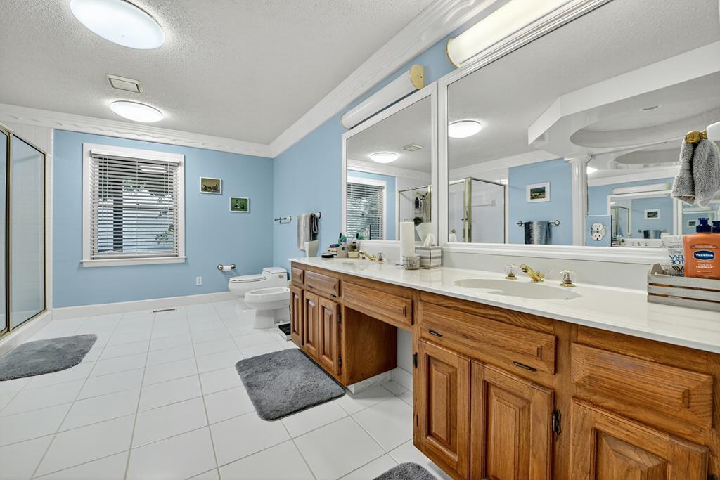 167 Whispering Pne Lane Cherry Log, GA 30522 - Photo 43 of 87 a spacious bathroom with a granite countertop sink mirror and