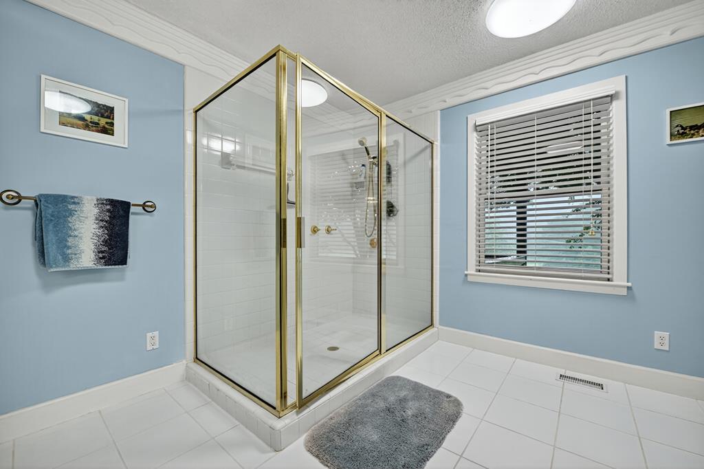 167 Whispering Pne Lane Cherry Log, GA 30522 - Photo 44 of 87 a view of an empty room with window and bathroom
