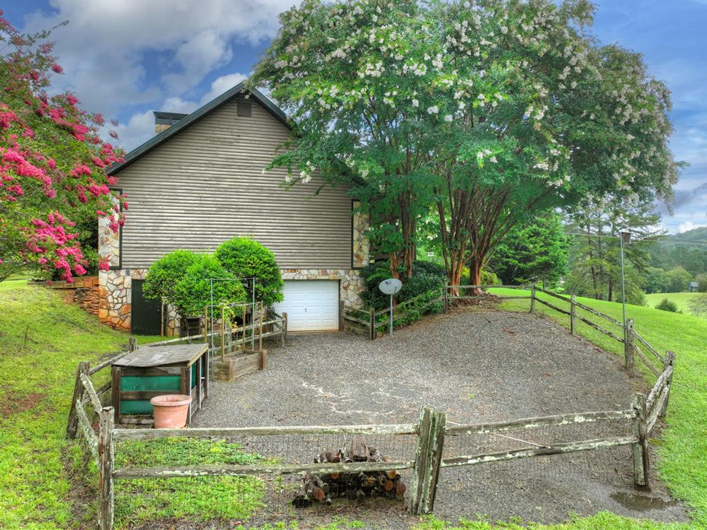 167 Whispering Pne Lane Cherry Log, GA 30522 - Photo 71 of 87 a backyard of a house with seating space