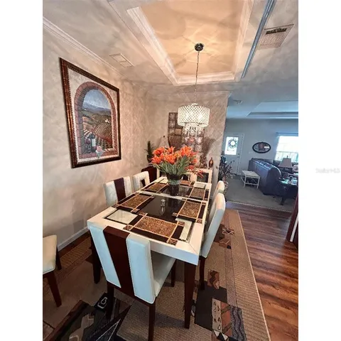 a view of a workspace with furniture