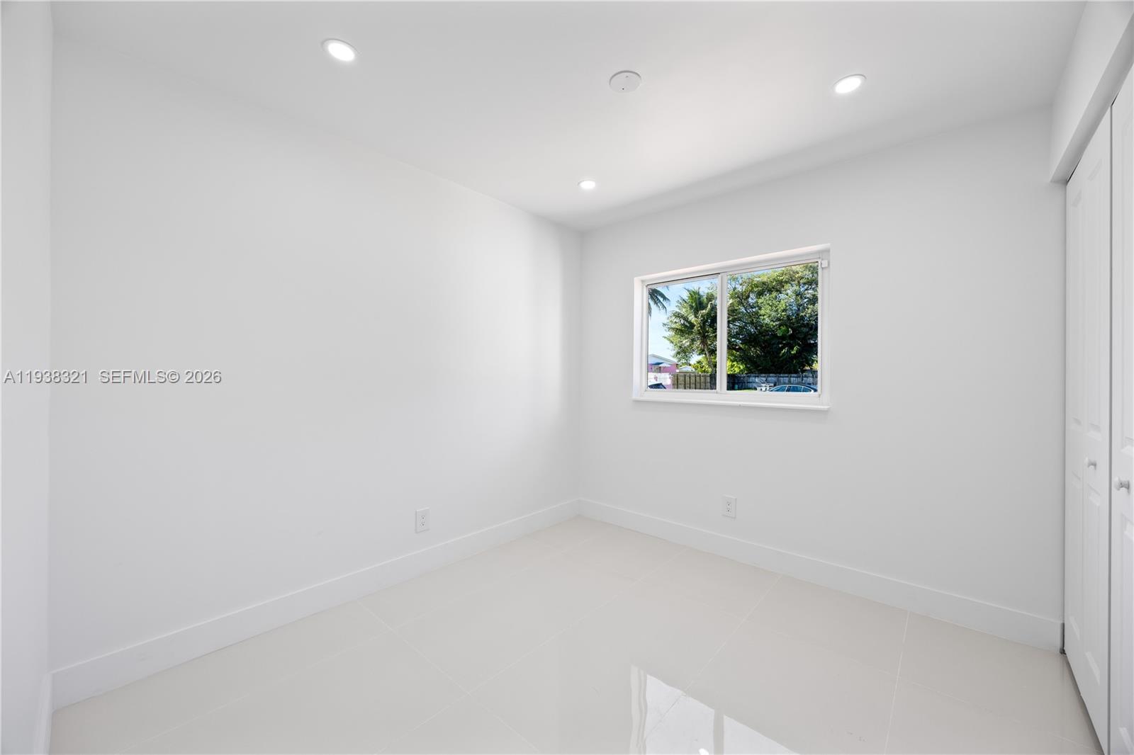 22503 Southwest 113th Place Miami, FL 33170 - Photo 14 of 35 a view of a window in a room