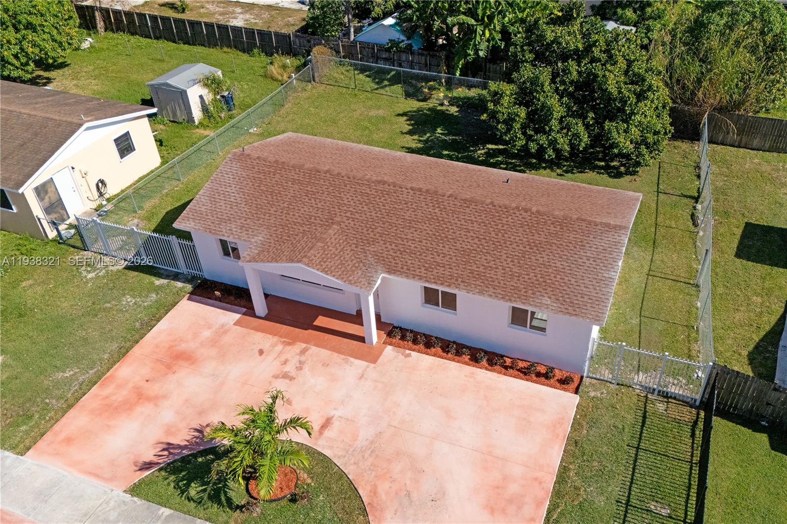 22503 Southwest 113th Place Miami, FL 33170 - Photo 25 of 35 an aerial view of a house with outdoor space and seating area