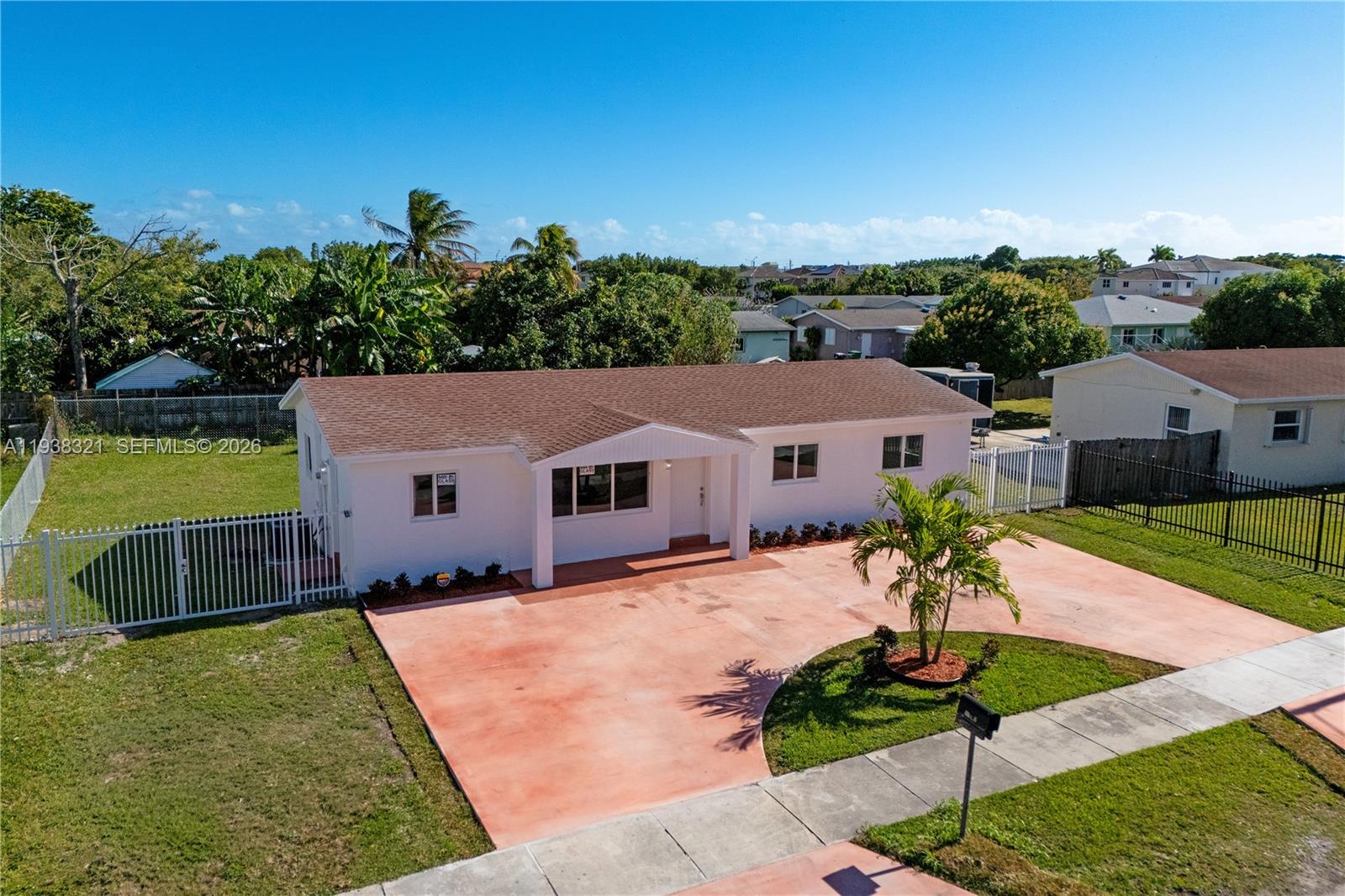 22503 Southwest 113th Place Miami, FL 33170 - Photo 26 of 35 a house view with a garden space