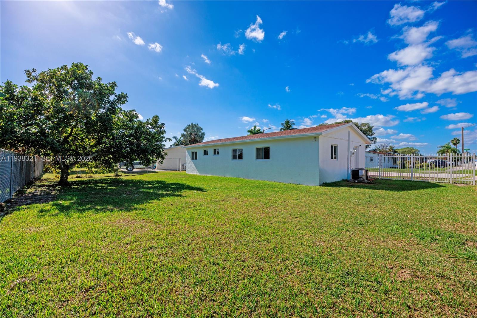 22503 Southwest 113th Place Miami, FL 33170 - Photo 34 of 35 a view of a house with a big yard