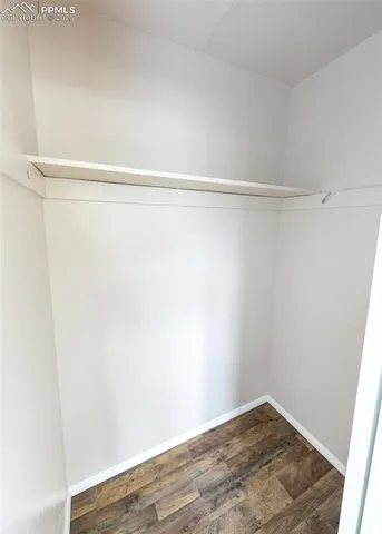 a view of small space with racks on the wall