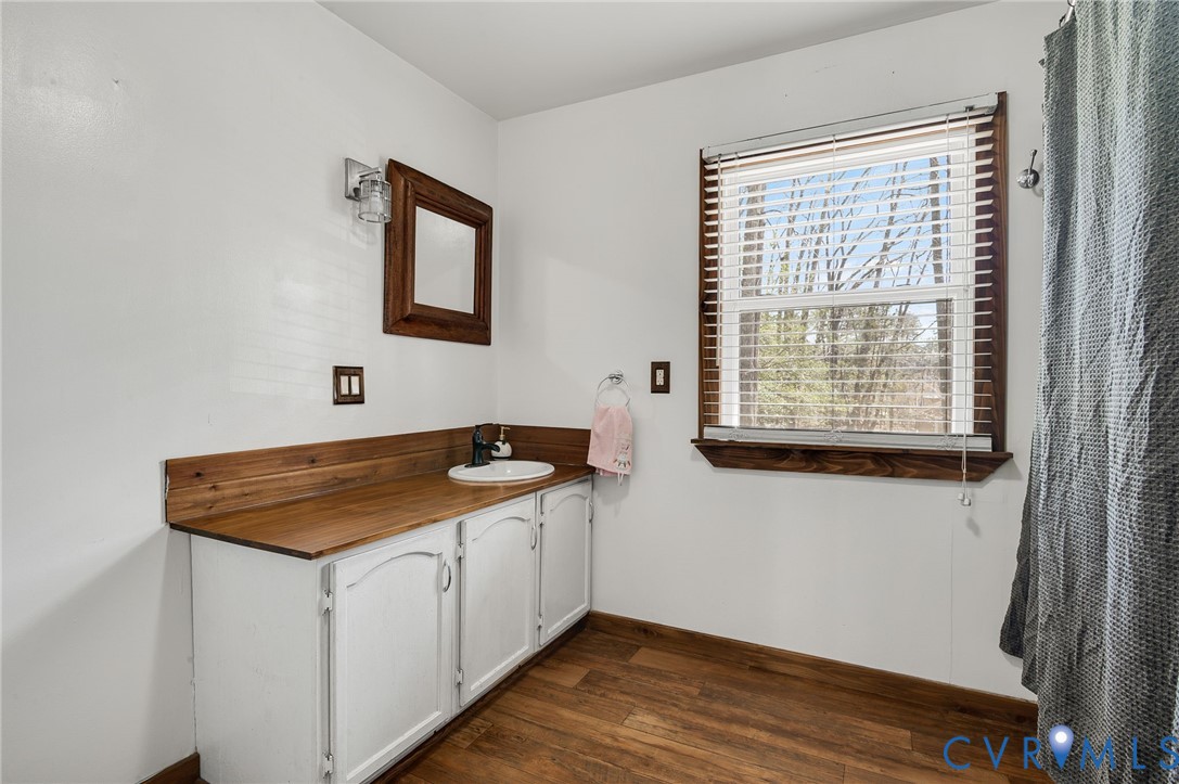 4740 West Grey Fox Circle Gum Spring, VA 23065 - Photo 14 of 21 a view of a kitchen that has a sink and a window
