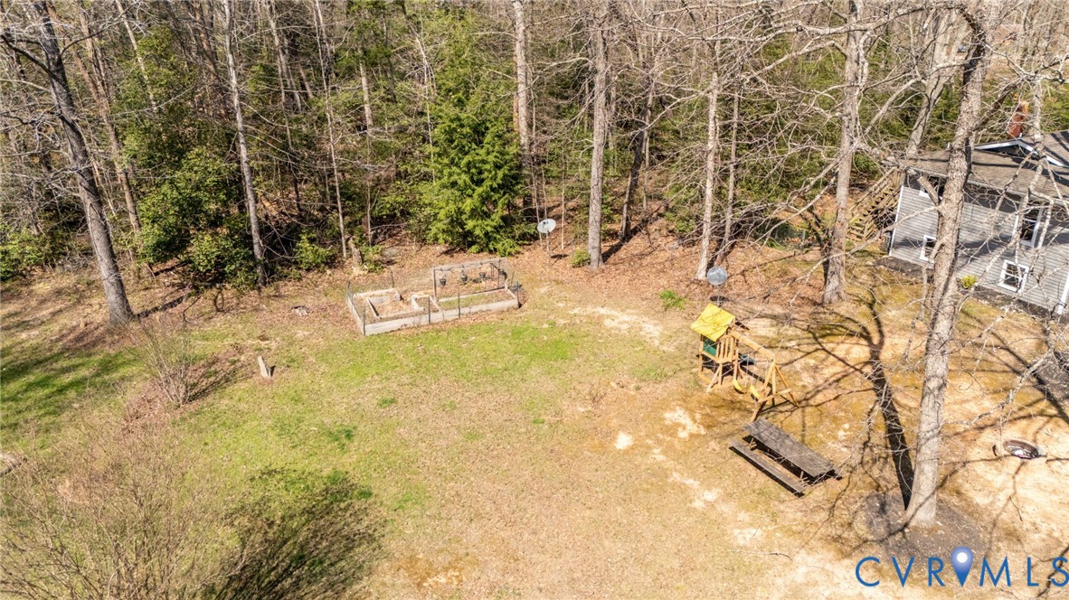 4740 West Grey Fox Circle Gum Spring, VA 23065 - Photo 3 of 21 a view of yard with trees