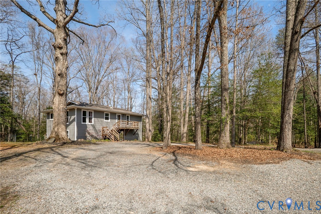 4740 West Grey Fox Circle Gum Spring, VA 23065 - Photo 4 of 21 front view of house with a trees