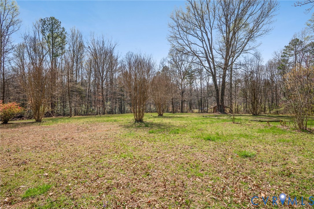 4740 West Grey Fox Circle Gum Spring, VA 23065 - Photo 6 of 21 a view of a yard