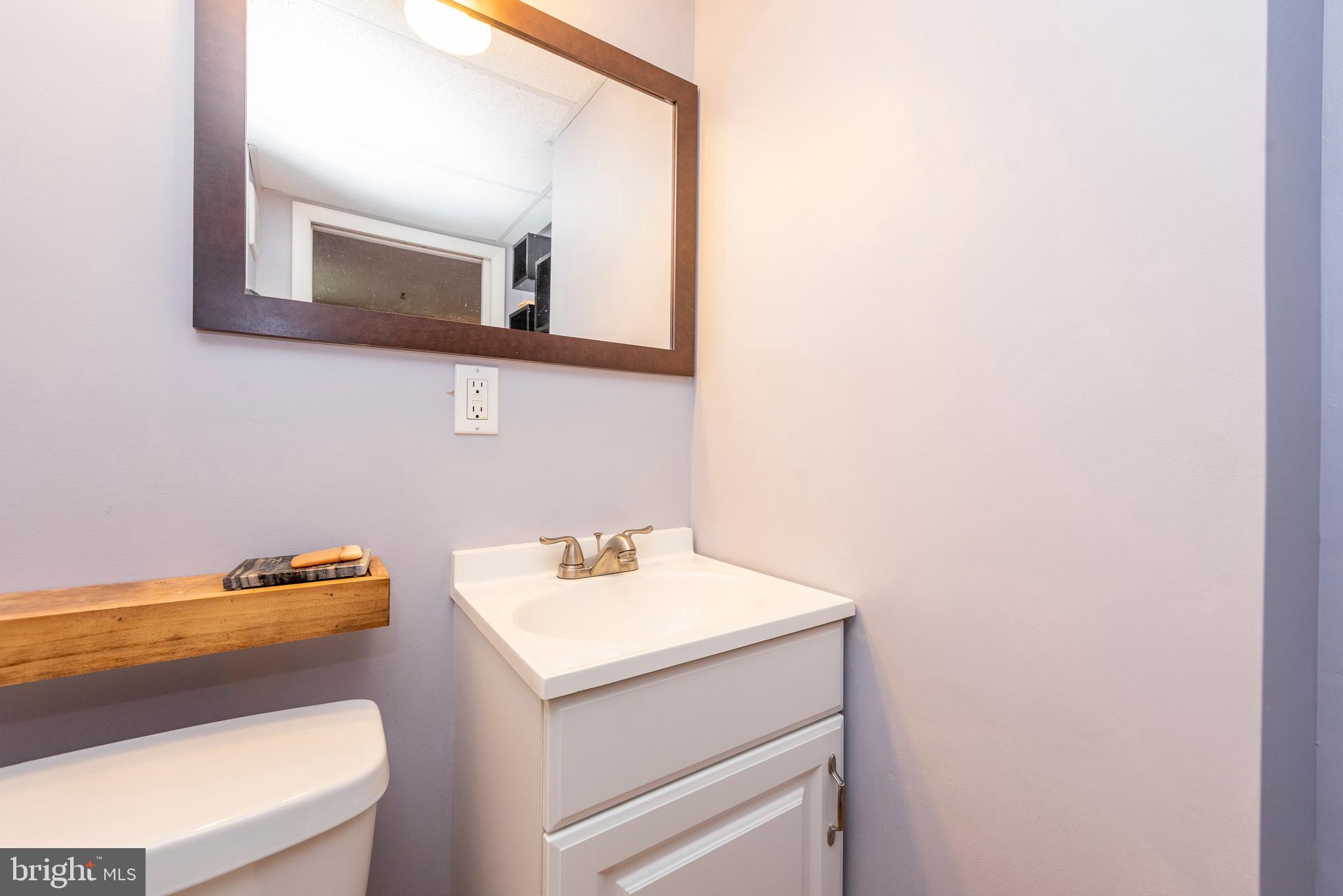 6023 Burnt Oak Road Baltimore, MD 21228 - Photo 33 of 36 Lower Level Powder Room