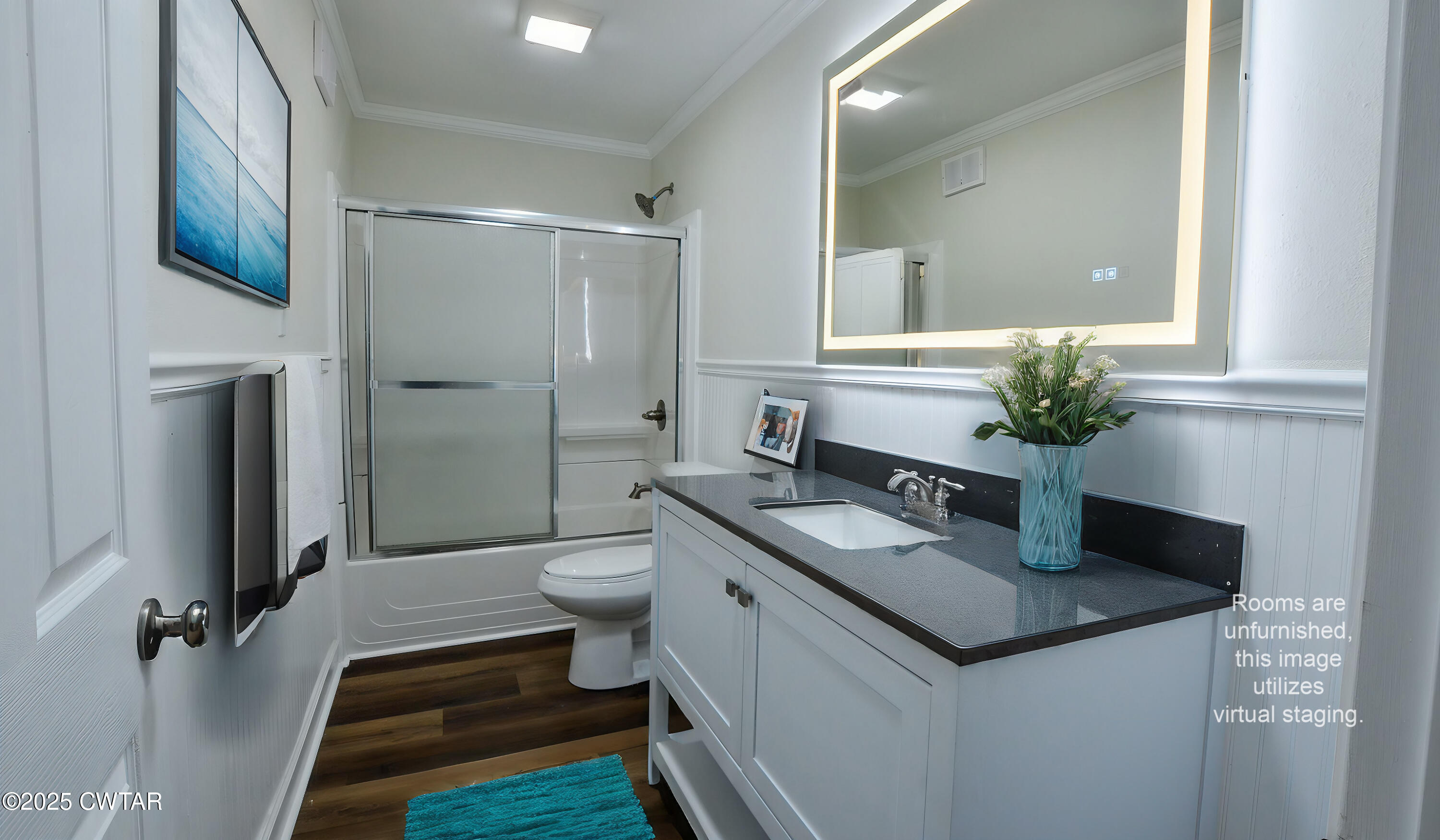 173 West Main Street Bells, TN 38006 - Photo 14 of 19 a bathroom with a granite countertop sink a toilet a mirror and shower