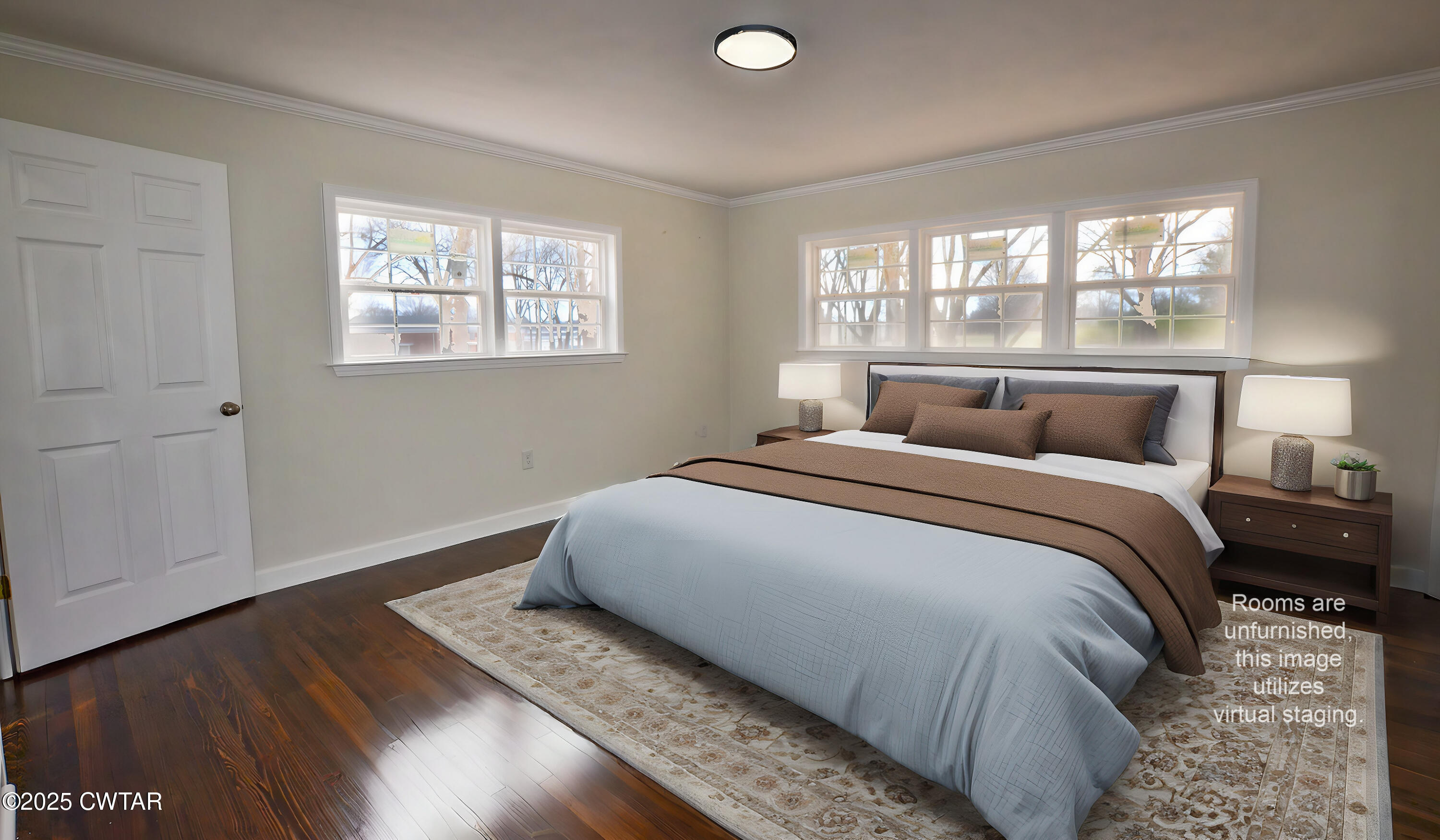 173 West Main Street Bells, TN 38006 - Photo 16 of 19 a bedroom with a bed and wooden floor