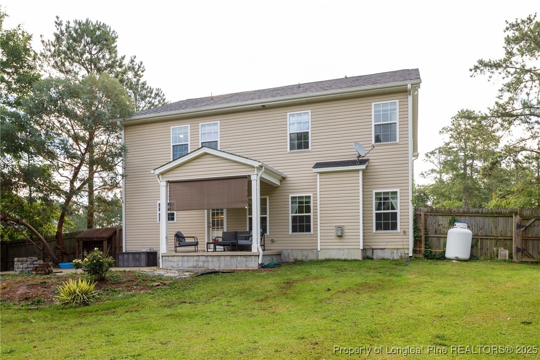 40 Cherry Hill Drive Lillington, NC 27546 - Photo 30 of 30 a view of a house with furniture and fire pit