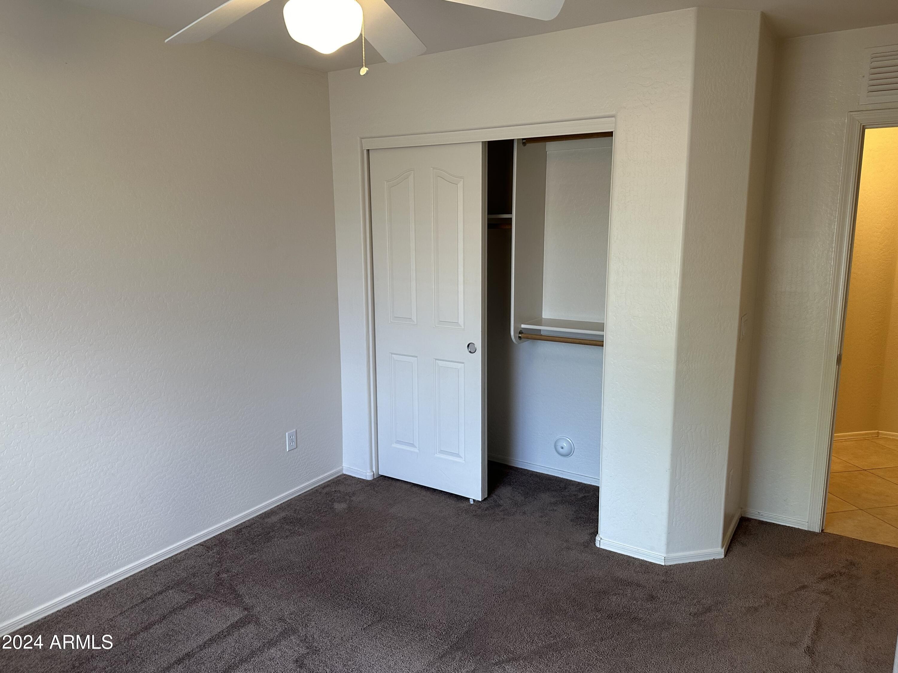17834 West Calavar Road Surprise, AZ 85388 - Photo 20 of 31 Bedroom closet