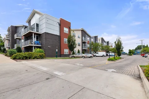 a view of a street with houses