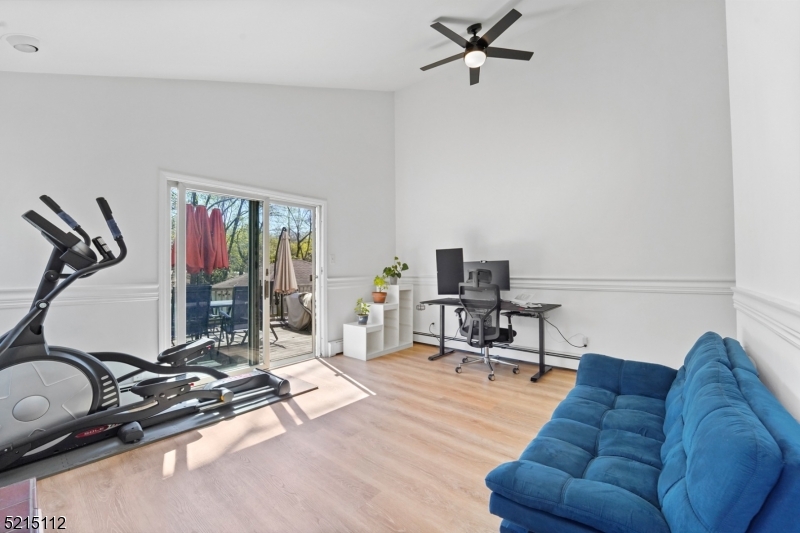 36 Dunnell Road Maplewood, NJ 07040 - Photo 16 of 35 a living room with furniture a air conditioner and a window