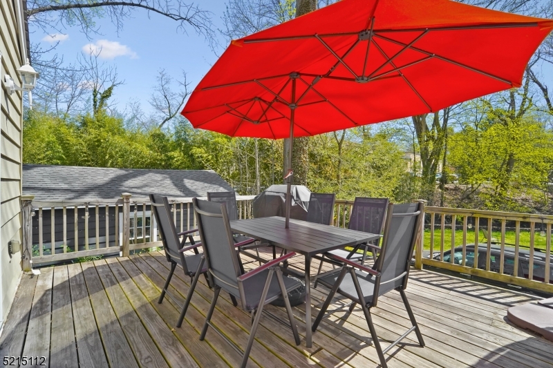 36 Dunnell Road Maplewood, NJ 07040 - Photo 18 of 35 a view of balcony with outdoor seating and wooden floor