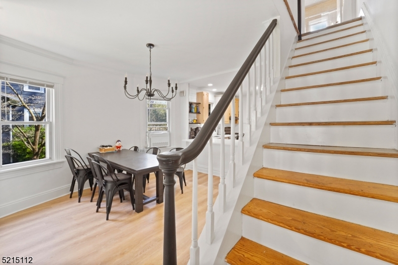 36 Dunnell Road Maplewood, NJ 07040 - Photo 20 of 35 a view of entryway and hall with wooden floor