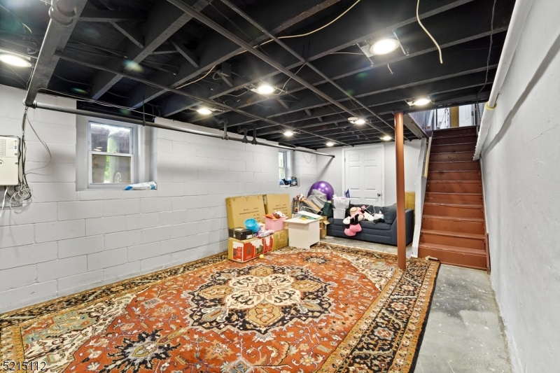 36 Dunnell Road Maplewood, NJ 07040 - Photo 32 of 35 a view of a storage room with a lot of stuff