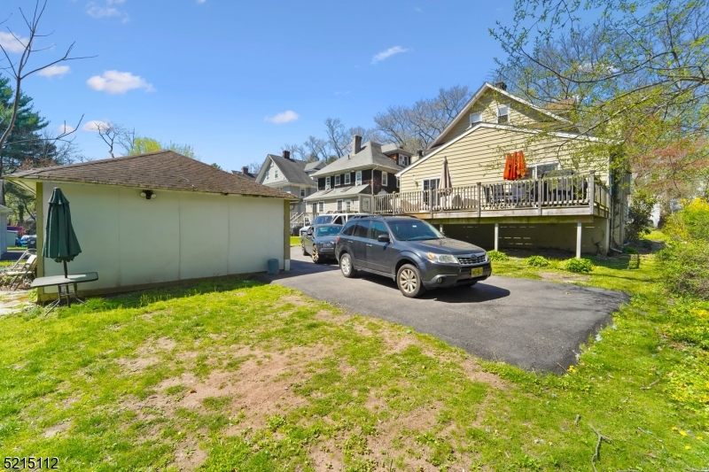 36 Dunnell Road Maplewood, NJ 07040 - Photo 33 of 35 a view of a house with backyard porch and furniture