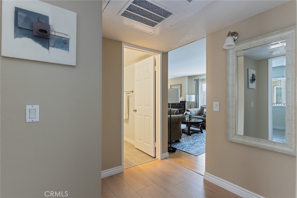 726 Elm Avenue, Unit 404 Long Beach, CA 90813 - Photo 14 of 31 a view of a hallway view with wooden floor and living room