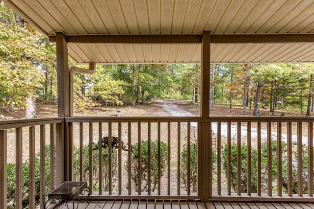 a view of a porch with a yard