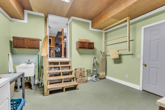 a workspace with furniture and window