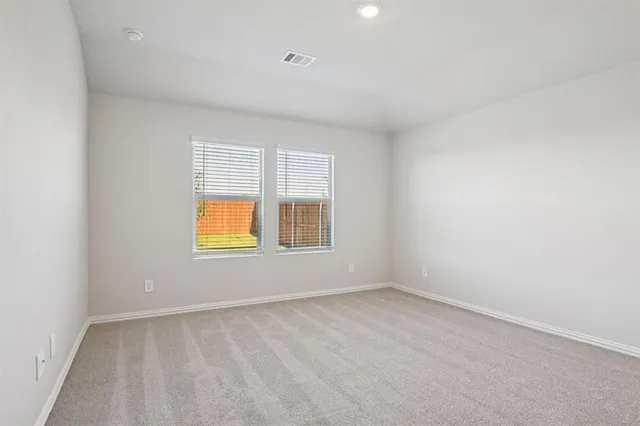 a view of hallway with wooden floor
