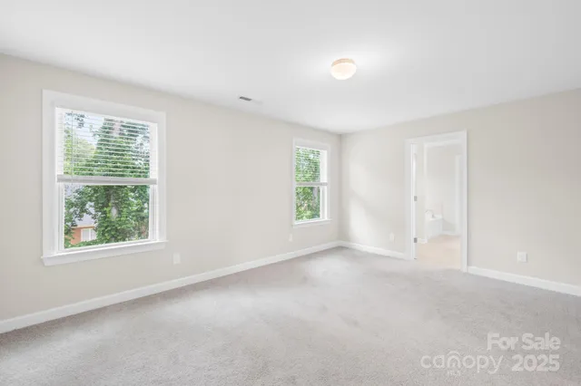 a bathroom with a double vanity sink and mirror