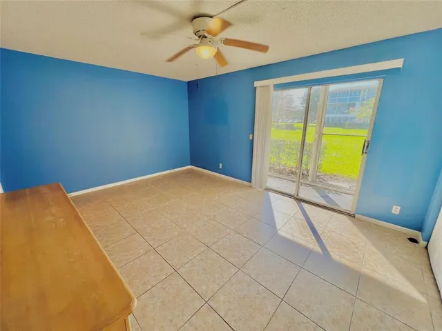 a bedroom with a bed and a mirror