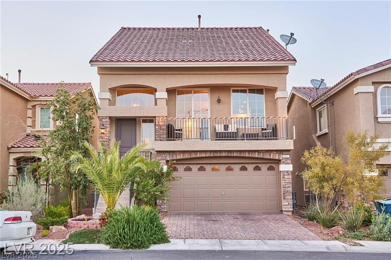 6302 Jackson Spring Road Las Vegas, NV 89118 - Photo 1 of 23 A terracotta-tiled roof and brick paver driveway welcome you home.