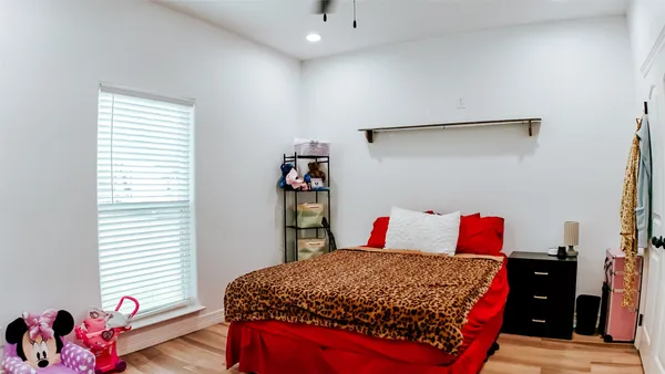 a view of swimming pool from a balcony