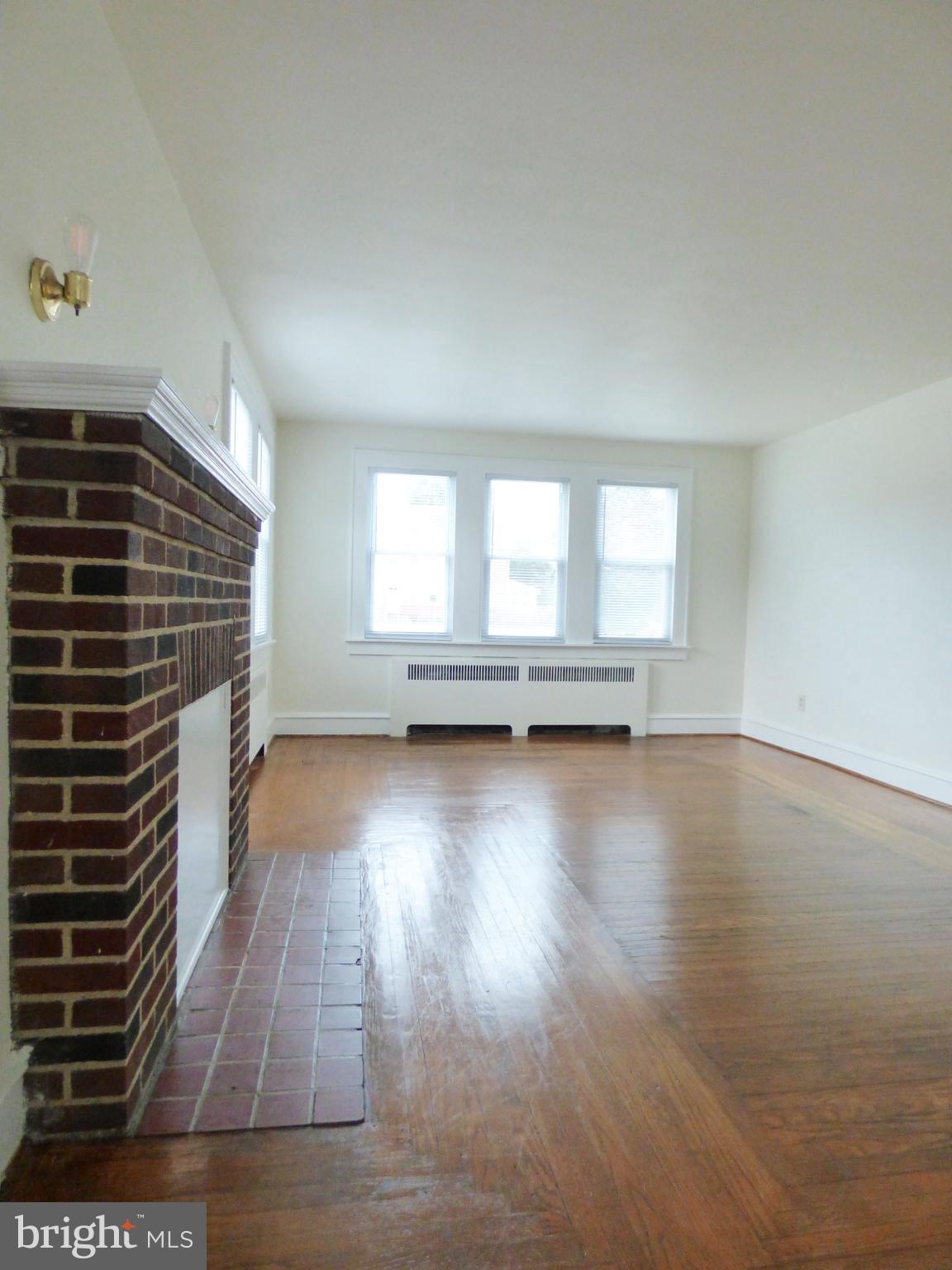 90 State Street, Unit 1 Penns Grove, NJ 08069 - Photo 14 of 21 a view of room with wooden floor and window
