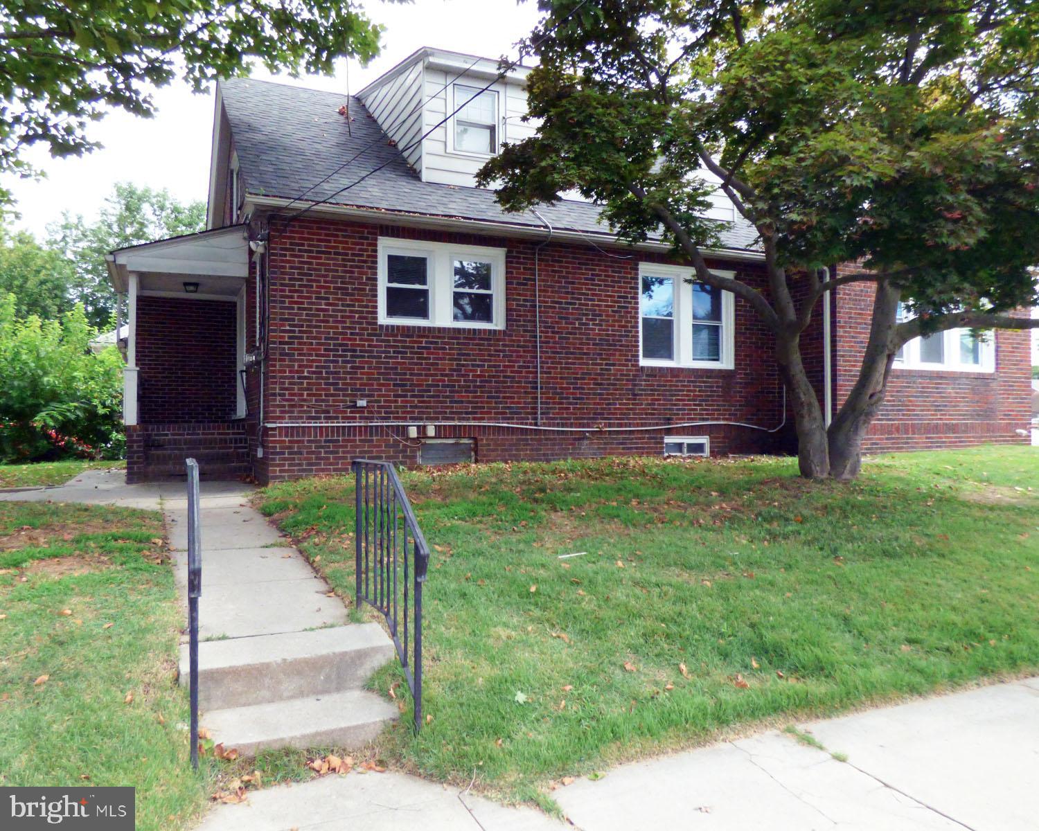 90 State Street, Unit 1 Penns Grove, NJ 08069 - Photo 3 of 21 a front view of a house with garden
