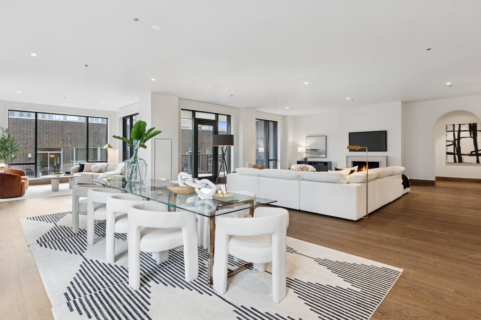 21 North May Street, Unit 402 Chicago, IL 60607 - Photo 18 of 63 a living room with furniture and a flat screen tv