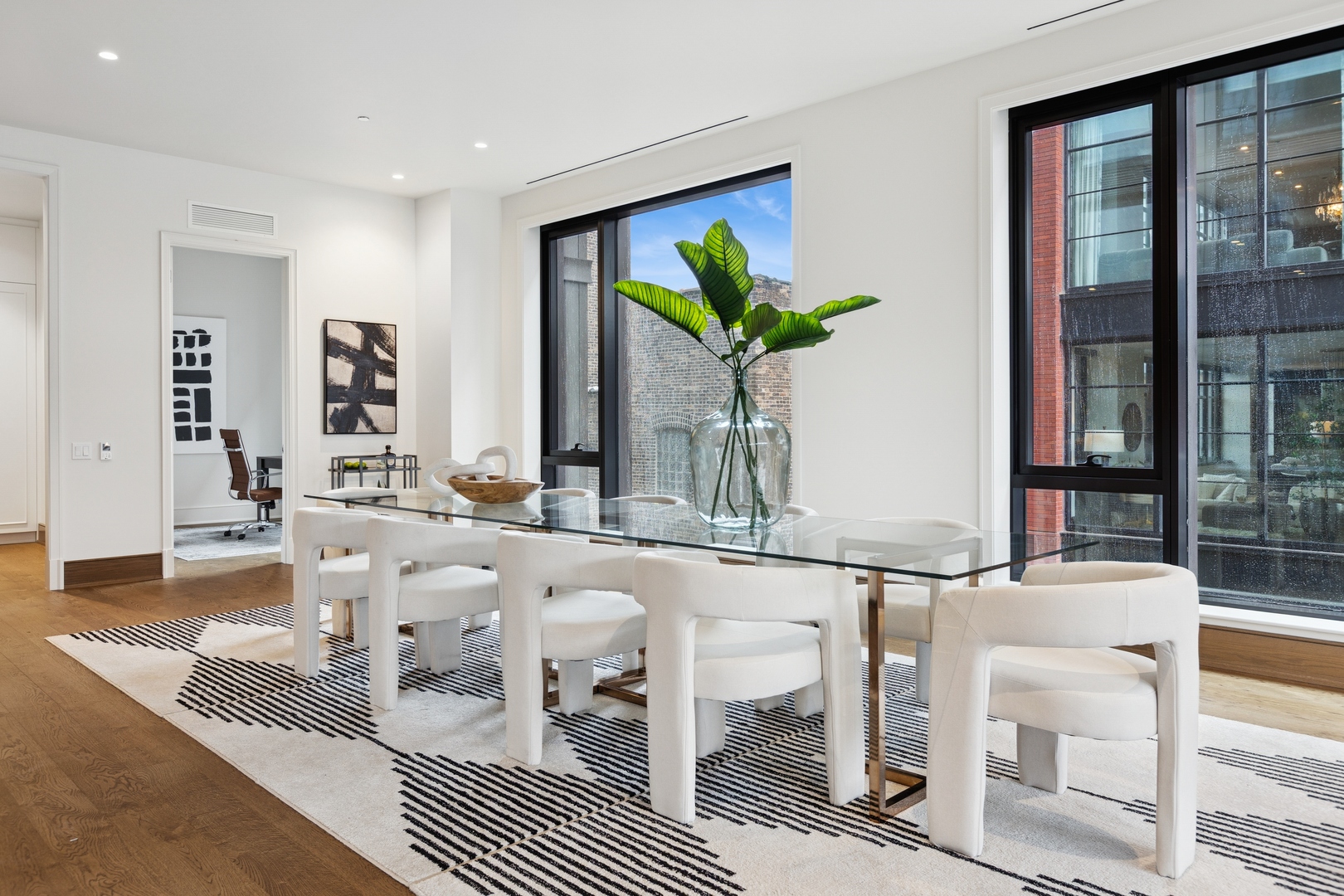 21 North May Street, Unit 402 Chicago, IL 60607 - Photo 22 of 63 a living room with fireplace furniture and a potted plant