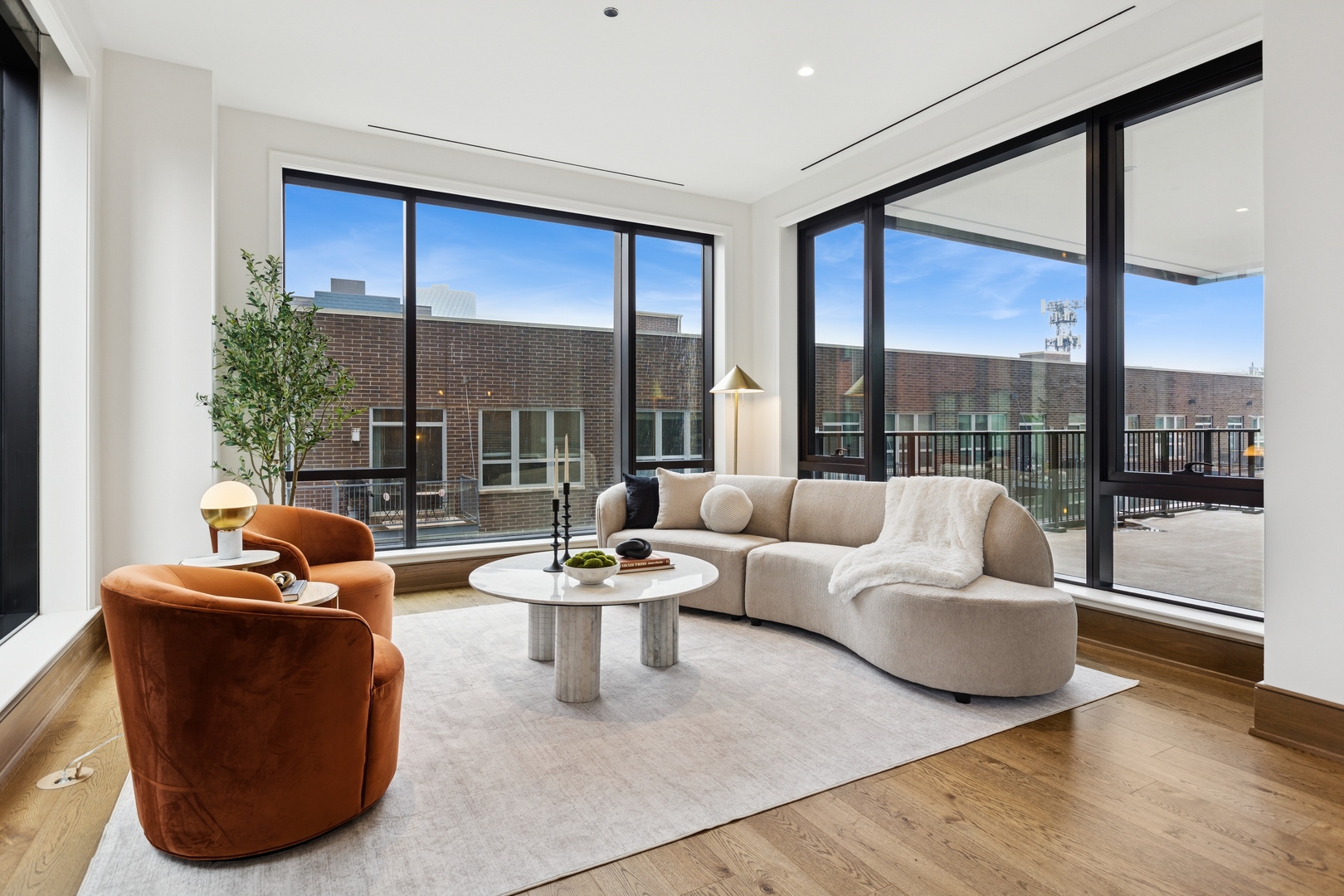 21 North May Street, Unit 402 Chicago, IL 60607 - Photo 24 of 63 a living room with furniture and a large window
