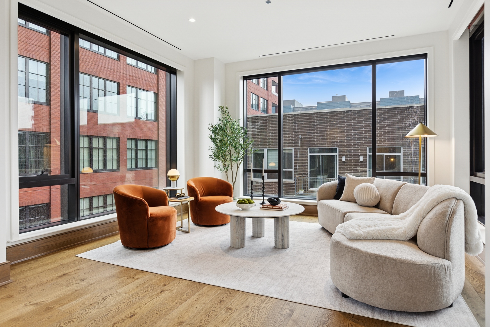 21 North May Street, Unit 402 Chicago, IL 60607 - Photo 26 of 63 a living room with furniture and a large window