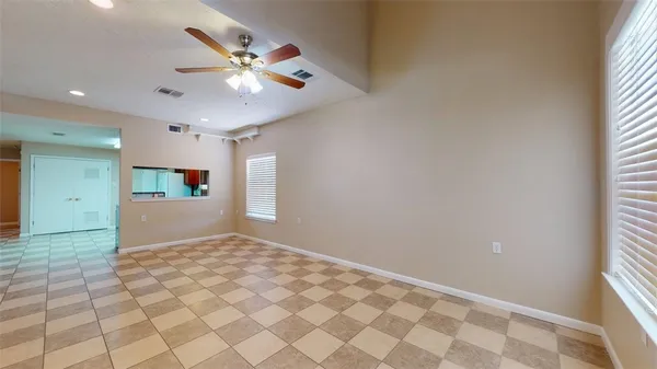 a view of an empty room and window