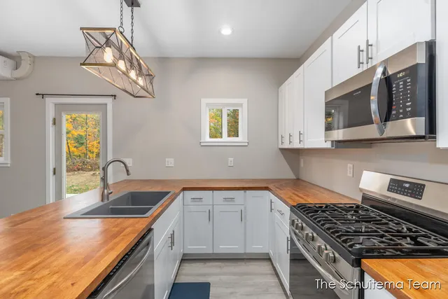 $460,000 | 8232 Holton Road, Holton, MI 49425