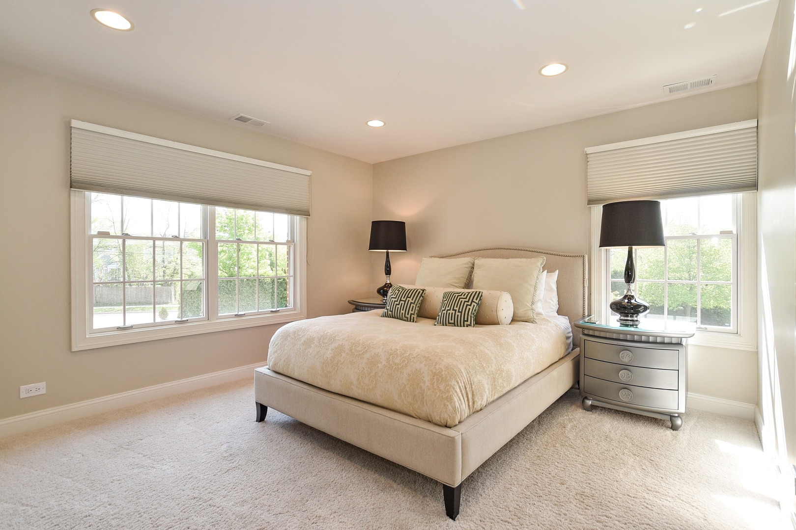 1085 Green Bay Road Glencoe, IL 60022 - Photo 12 of 24 a bedroom with a bed lamp and window